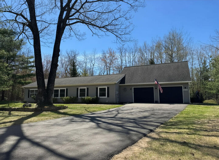 Property Photo:  6708 Tremble Trail  MI 49769 