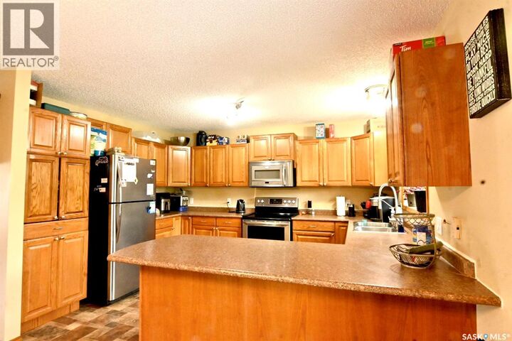 Property Photo:  311 Walter Scott Avenue  SK S0G 2E0 