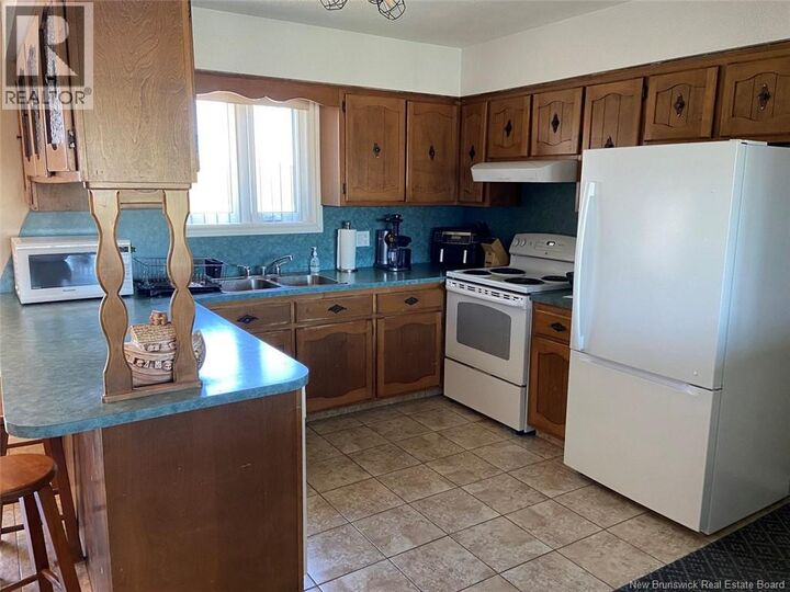 Property Photo: 20 Sirois Road NB E7E 1H9