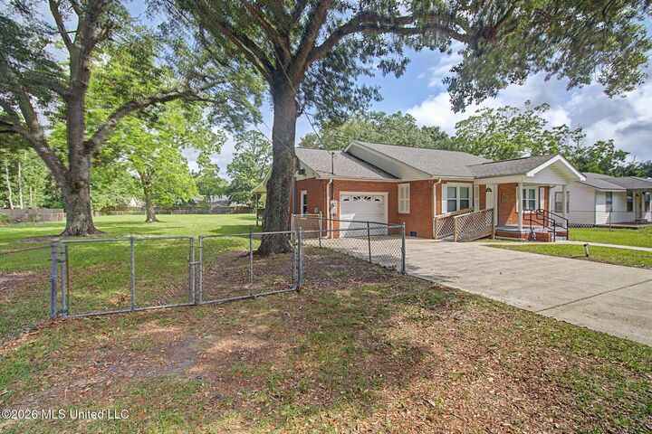 Property Photo:  220 W Old Pass Road  MS 39560 