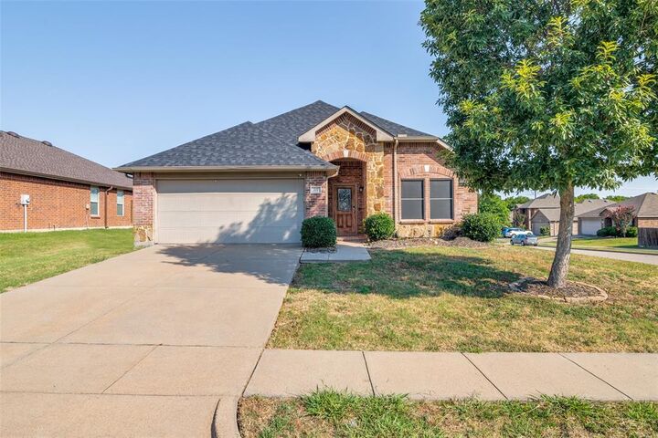 Property Photo: 707 Windflower Drive TX 75087