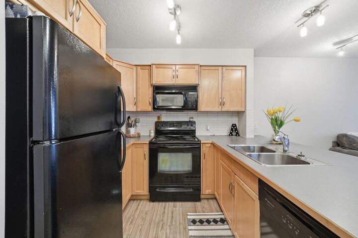 Photo de la propriété:  8200 4 Street NE 104  AB T3K 0K5 