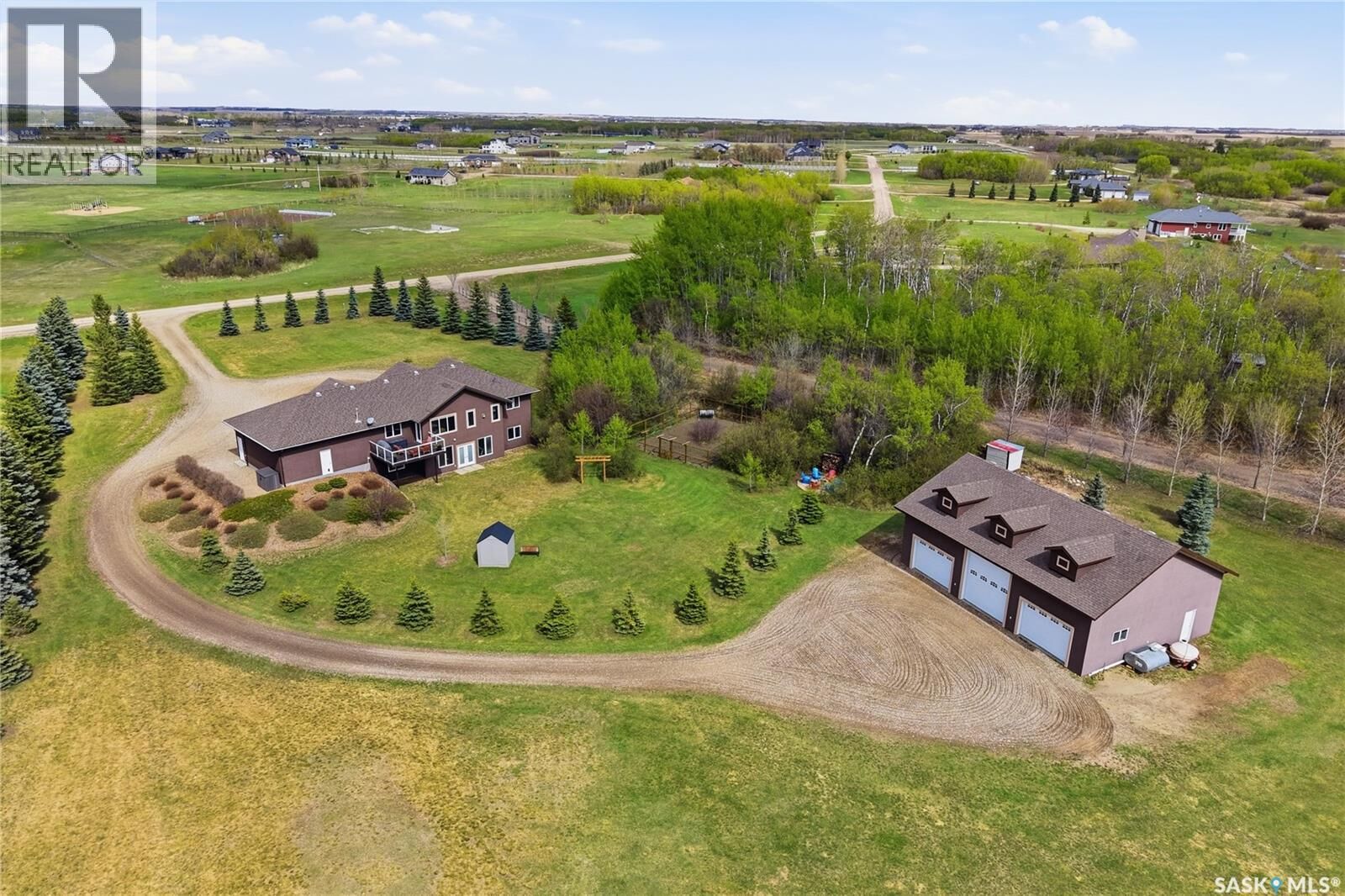 Property Photo:  11 Country Road  SK S7C 0A7 