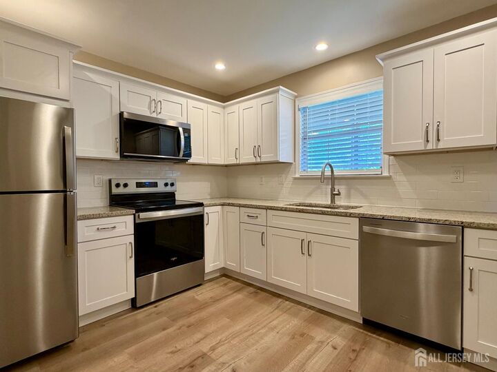 Property Photo:  8 Benjamin Franklin Drive F  NJ 08831 