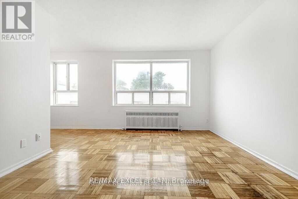 Property Photo:  156 Kingston Road 306  ON M4L 1S7 