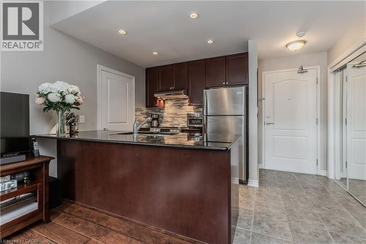 Property Photo: 5327 Upper Middle Road 205 ON L7L 0E9