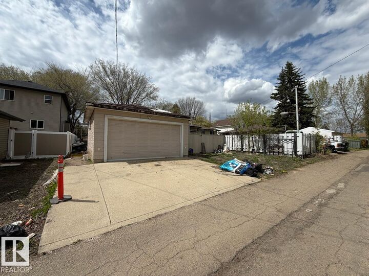 Property Photo:  11839 56 Street NW  AB T5W 3S7 