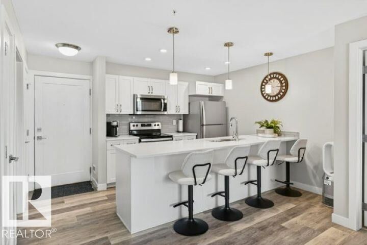 Property Photo: 1029 173 Stnw SW 209 AB T6W 3E4