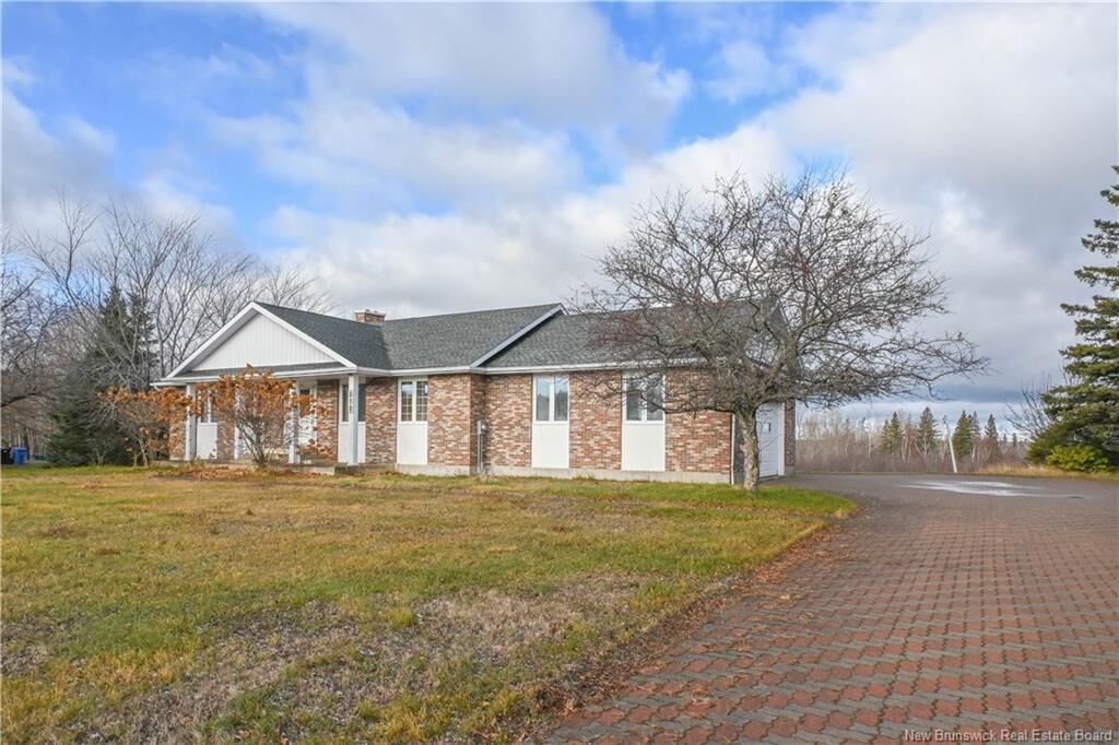 Property Photo:  858 Boul Des Acadiens Boulevard  NB E1W 1H3 