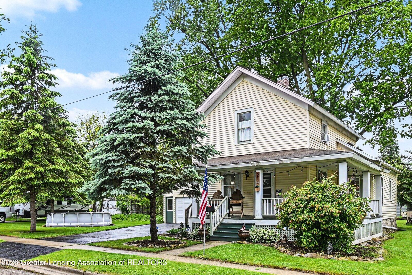 Property Photo:  214 Crossman Street  MI 48895 