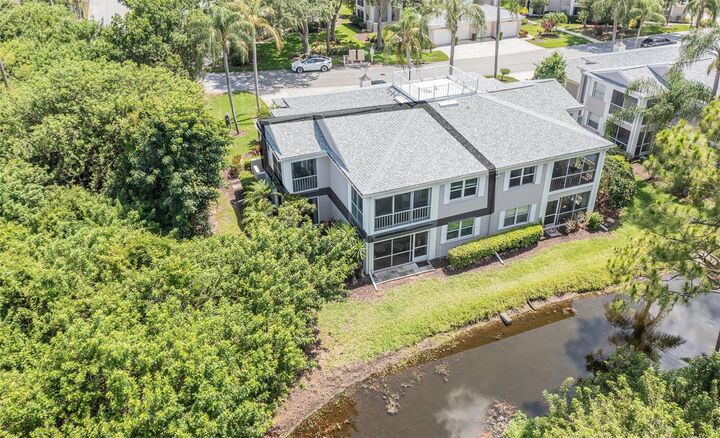 Property Photo:  5658 Sheffield Greene Circle 66-17  FL 34235 