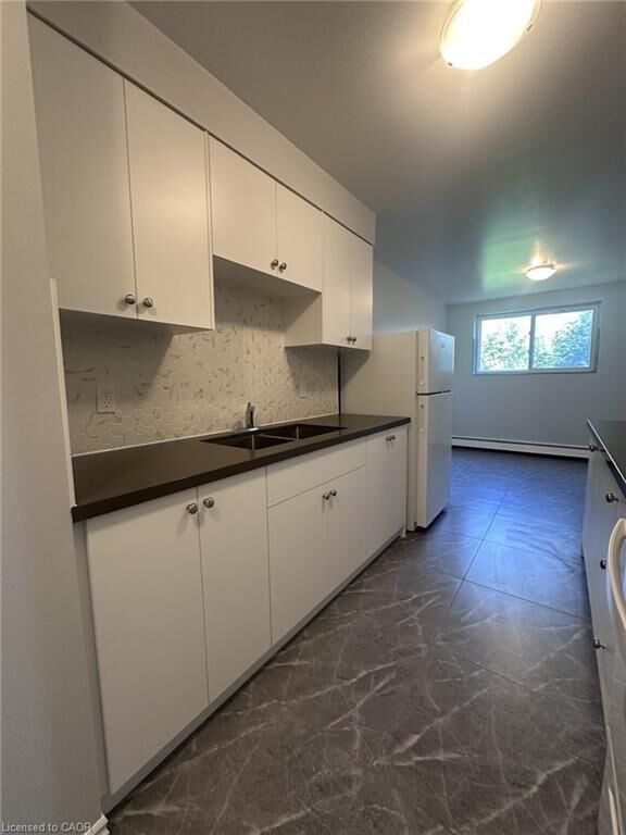 Property Photo: 15 Mowat Boulevard 13 ON N2E 1J1