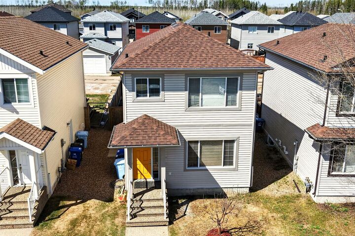 Property Photo:  128 Juniper Street  AB T9K 0M8 