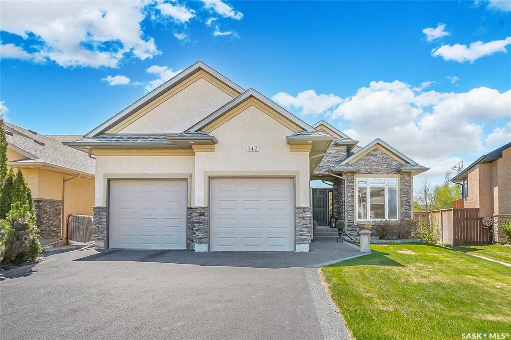 Property Photo:  142 Assaly Street  SK S7T 0E4 