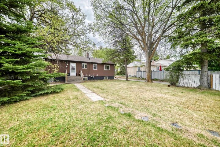 Property Photo:  10714 135 Street NW  AB T5M 1J6 