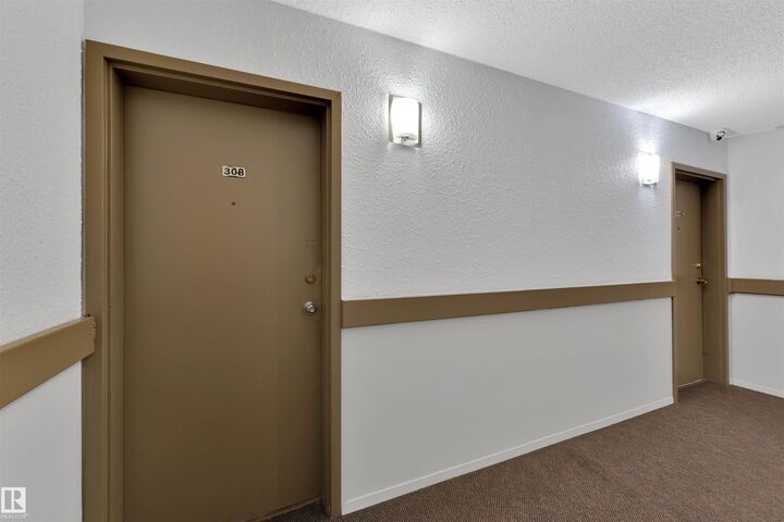 Property Photo: 1620 48 Street NW 308 AB T6L 5P1