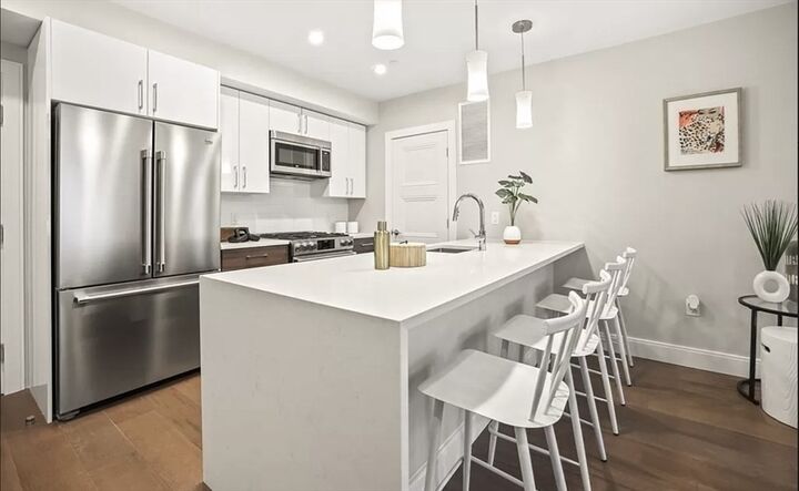Property Photo:  425 Lagrange St 210  MA 02132 