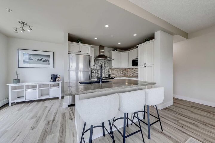 Property Photo:  716 5 Street NE 305  AB T2E 3W8 