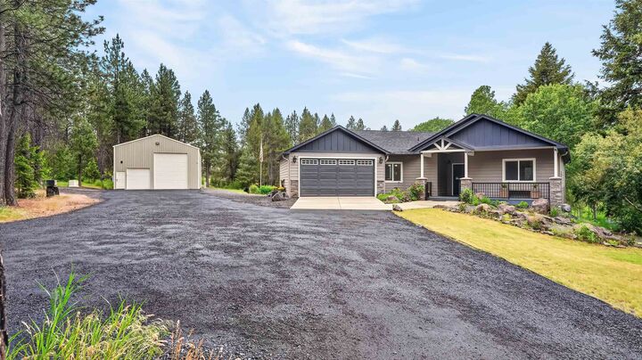 Property Photo:  515 W Chattaroy Rd  WA 99005 
