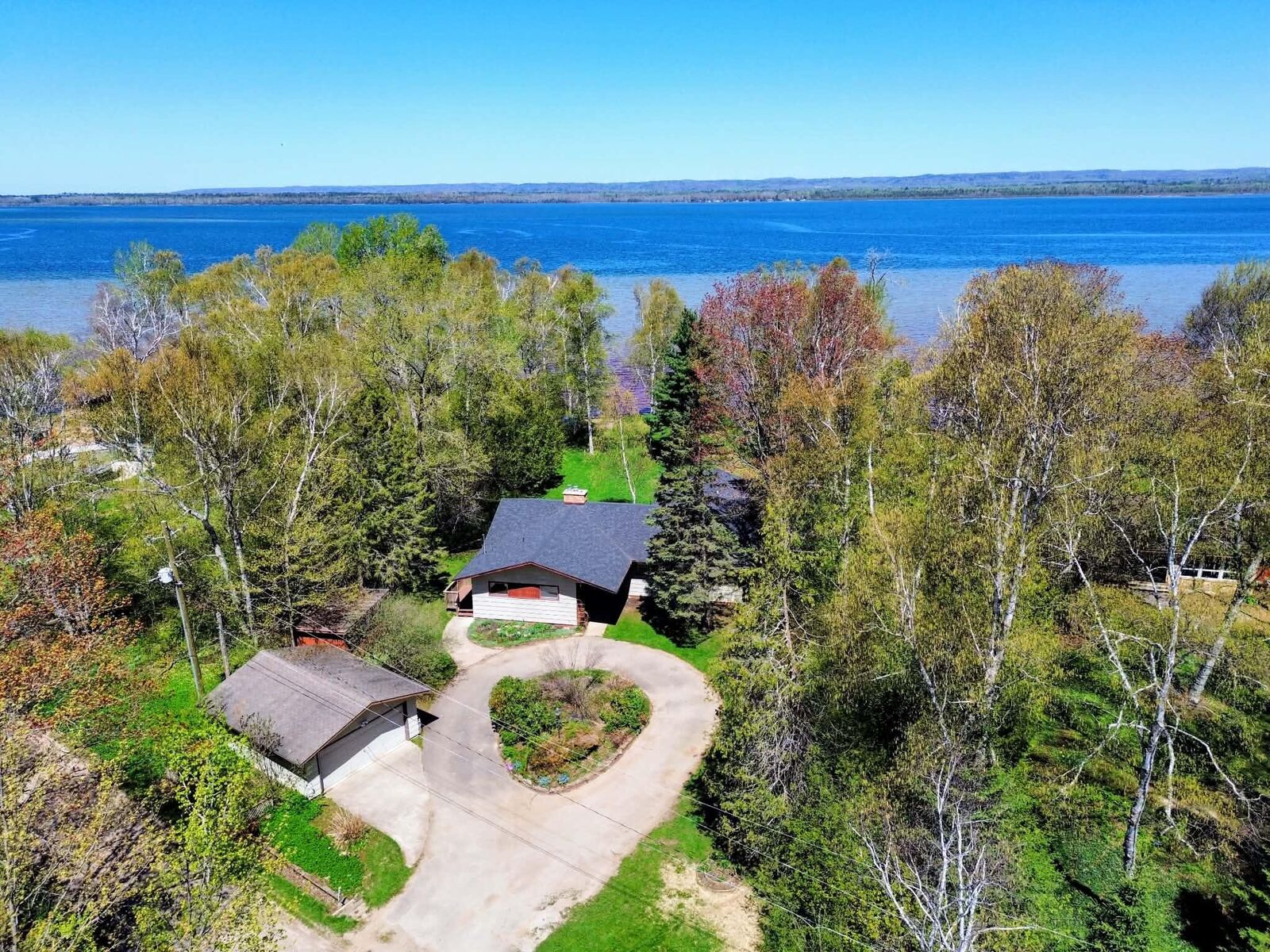 Property Photo:  3468 Lakeshore Dr  MI 49783 
