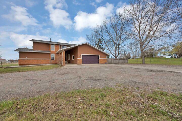 Property Photo: 283129 Township Road 250 AB T1X 0M8