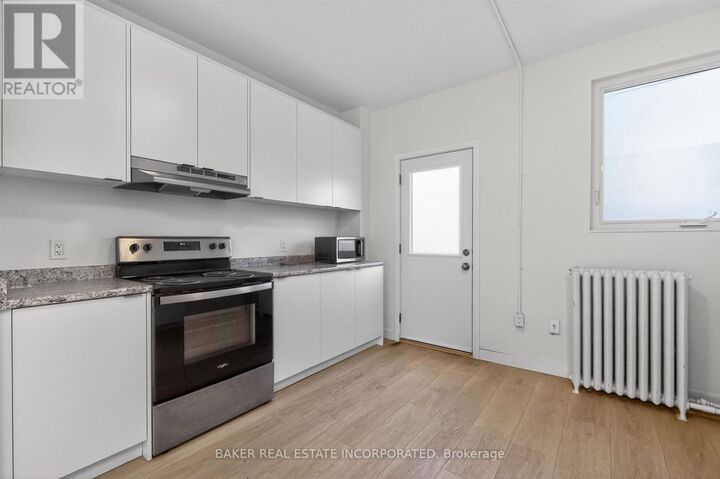 Property Photo: 922 Queen Street East 2 ON M4M 1J5
