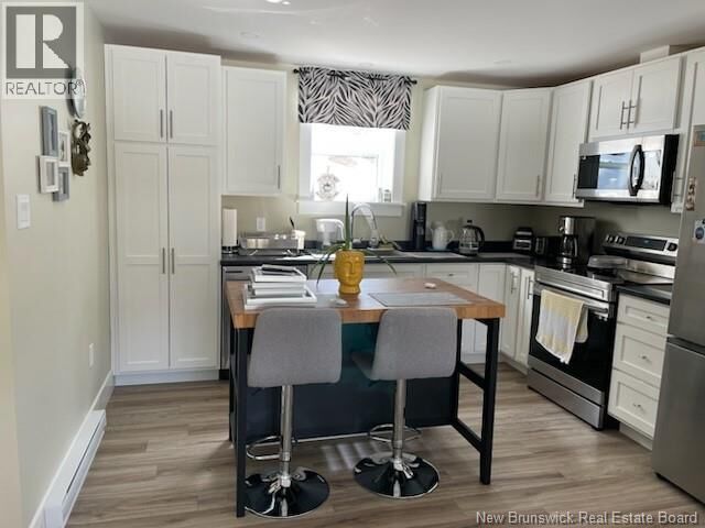 Property Photo: 67 Dewitt Acres NB E3A 6S3