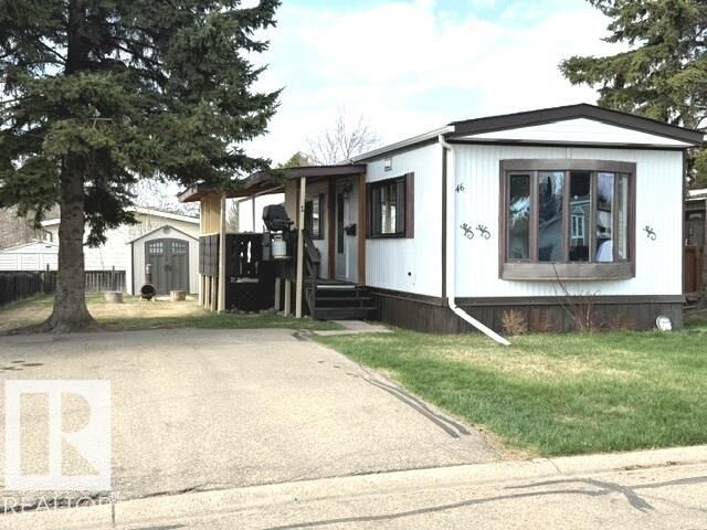 Property Photo: 46 Oakridge Drive NW AB T6P 1H1