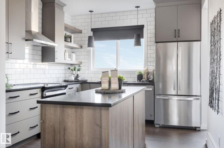 Property Photo: 21120 25 Ave NW AB T6M 3H1