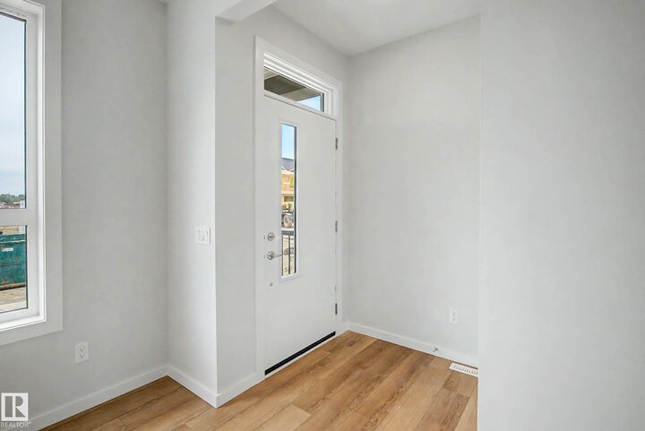 Property Photo:  21120 25 Ave NW  AB T6M 3H1 