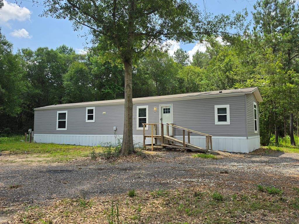 Property Photo:  195 Cr 4675  TX 77364 