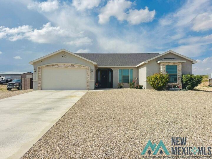 Property Photo: 832 Calamity Jane Drive NM 88220