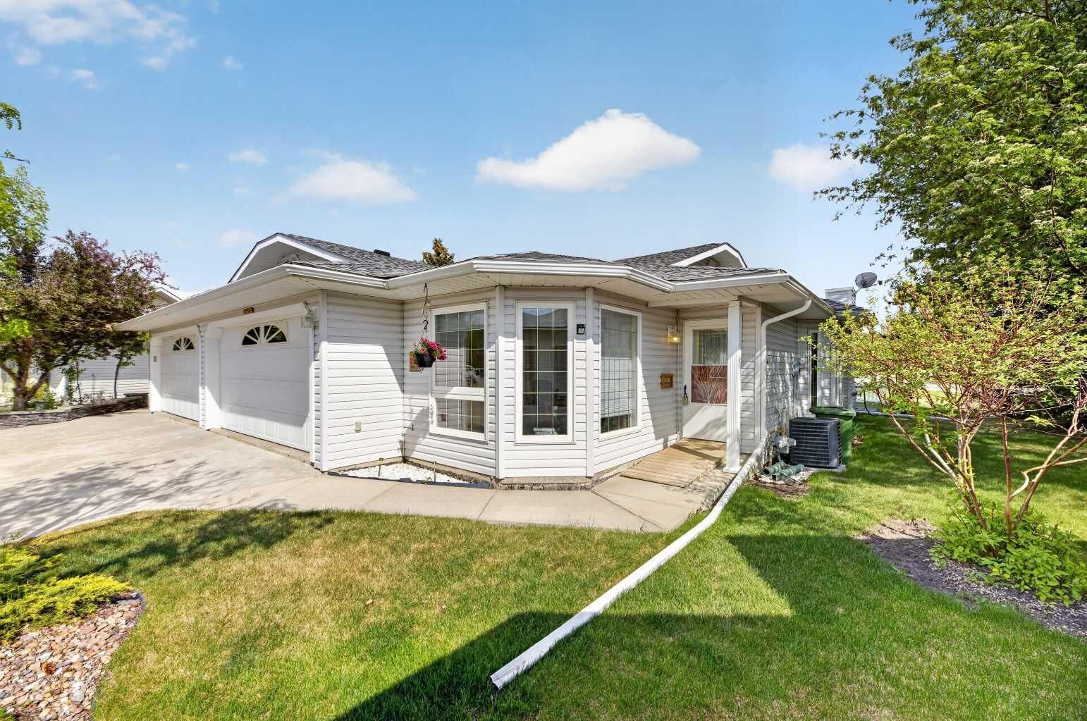 Property Photo:  5611 Sunrise Crescent  AB T4H 1V9 
