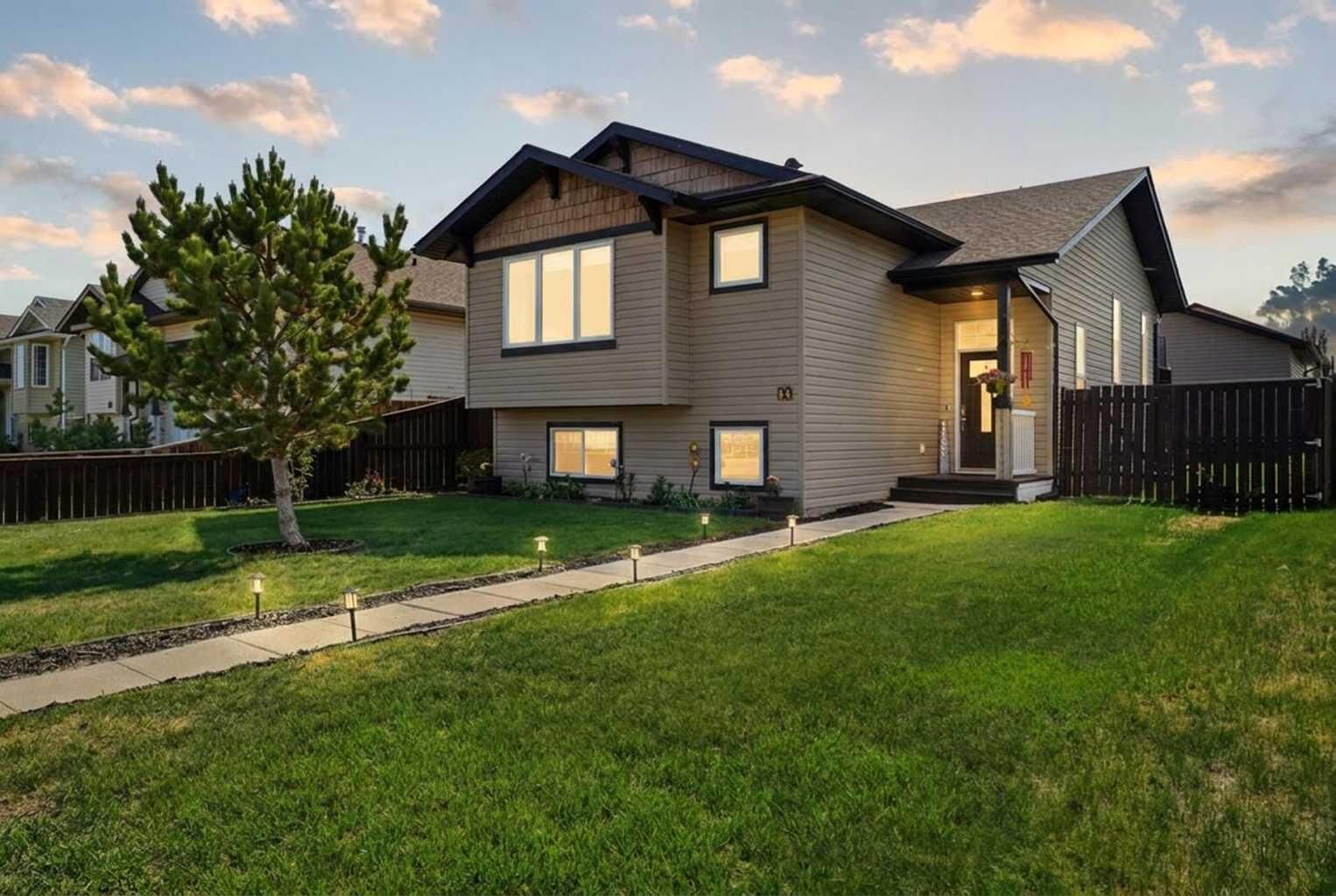 Property Photo: 65 Garden Road AB T4L 2P1