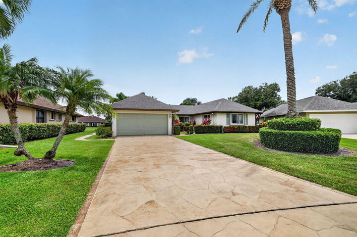 Property Photo:  10460 Greentrail Drive N  FL 33436 