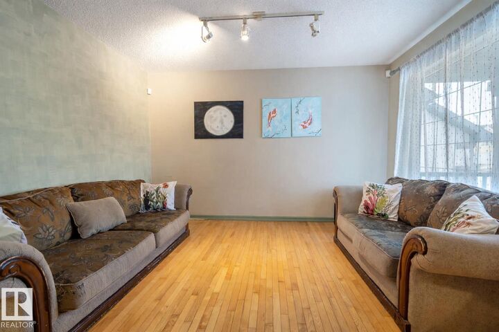Property Photo: 11813 12 Avenue NW AB T6J 7E4