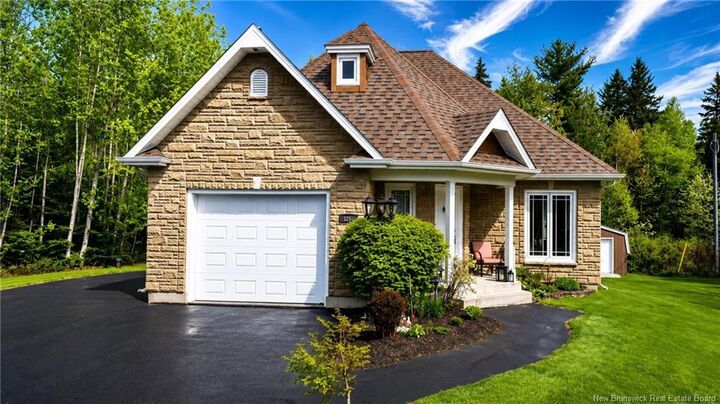 Property Photo:  502 Woodland Drive  NB E2A 4Z1 