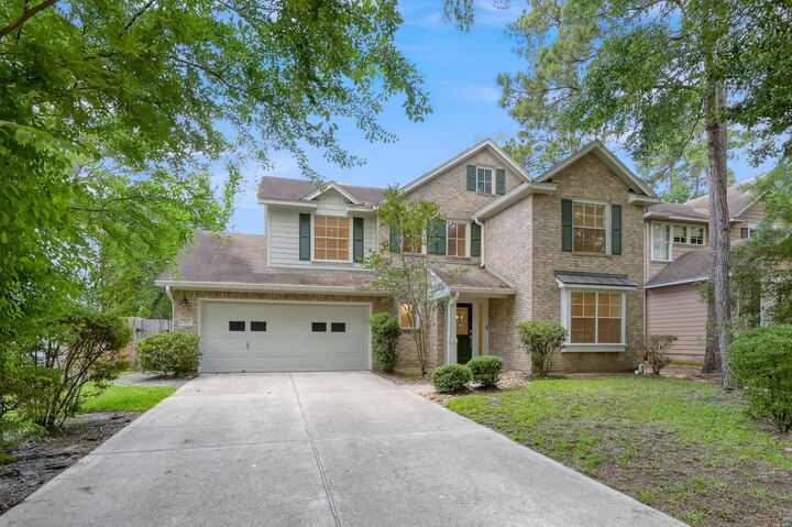 Property Photo: 34 S Willow Point Circle TX 77382