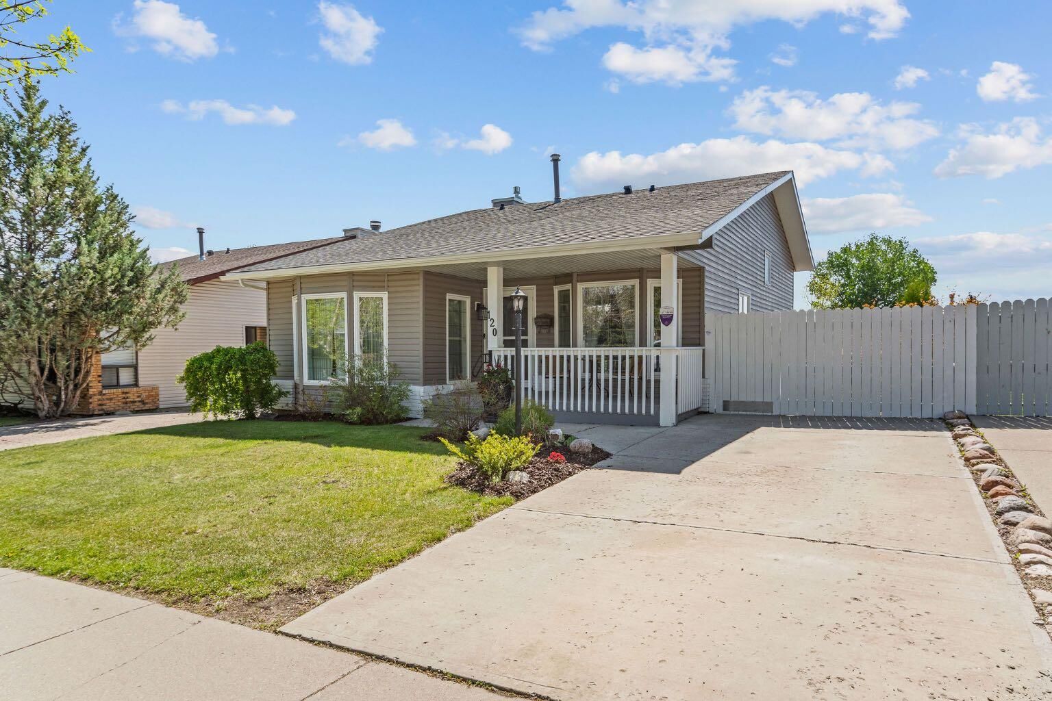 Property Photo:  120 Shawnessy Drive SW  AB T2Y 1B4 