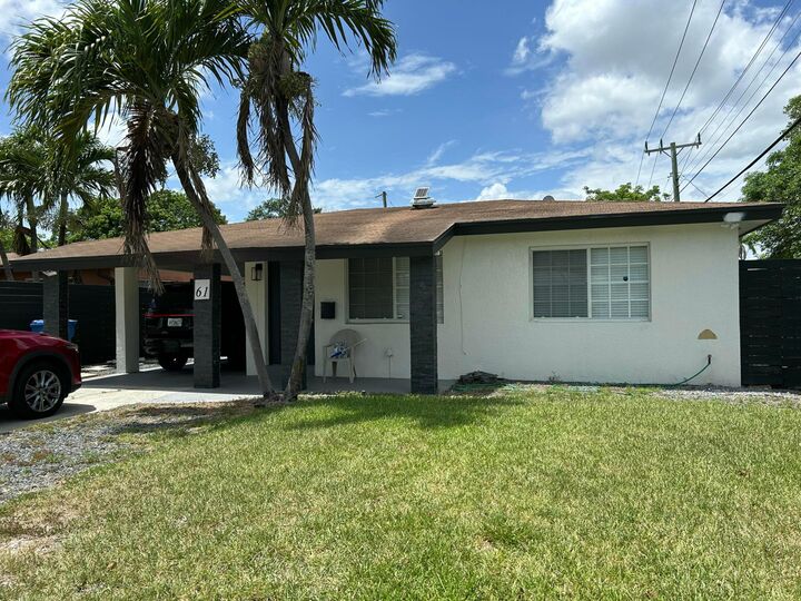 Property Photo: 61 NW 47th Street FL 33309