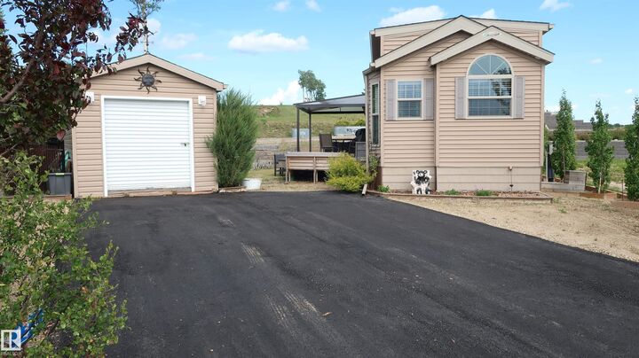 Property Photo: 454029 Rge Road 11 134 AB T0C 2V0