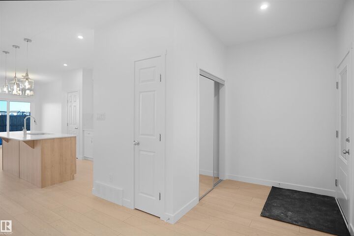 Property Photo:  20940 16 Avenue NW  AB T6M 1P7 