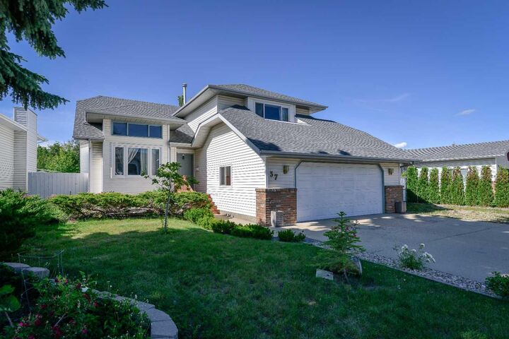 Property Photo: 37 Denovan Crescent AB T4R 2B6