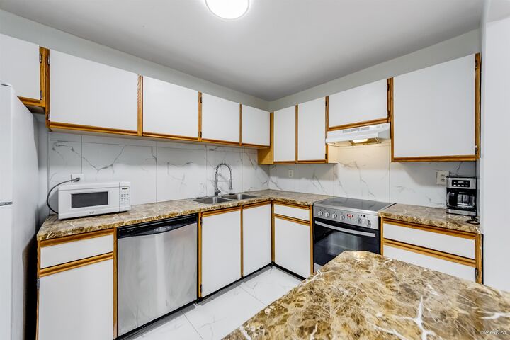 Property Photo: 13364 102 Avenue 108 BC V3T 5L8