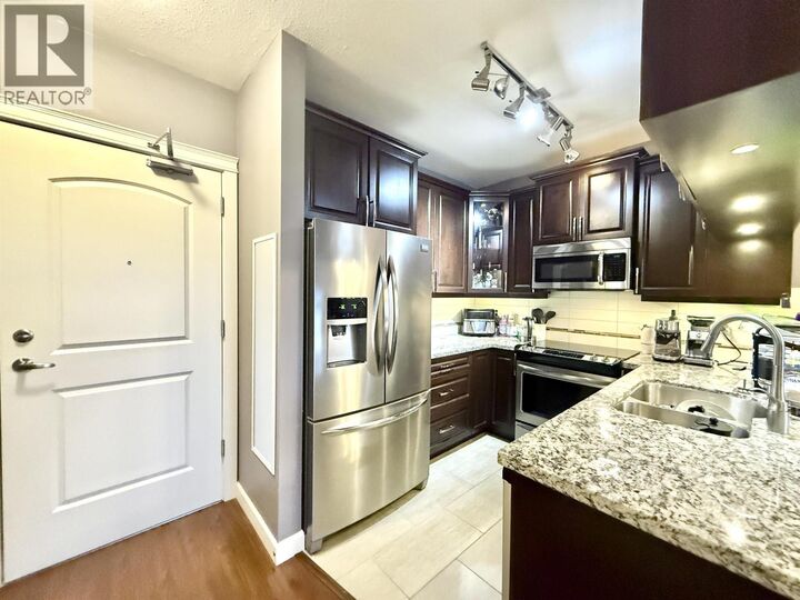 Property Photo:  12655 190A Street 209  BC V3Y 0E9 