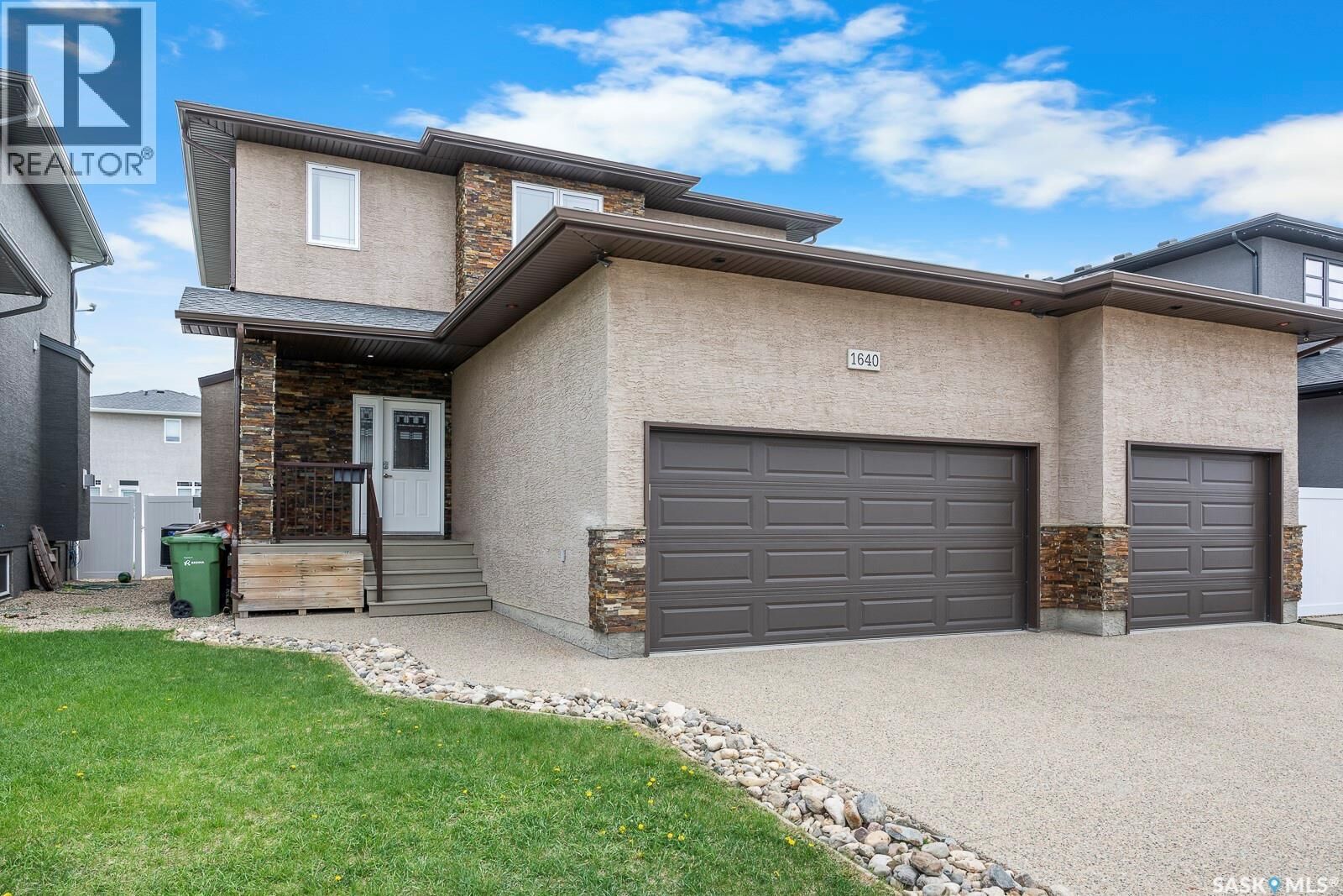 Property Photo:  1640 Maple Rose Crescent N  SK S4X 0J6 