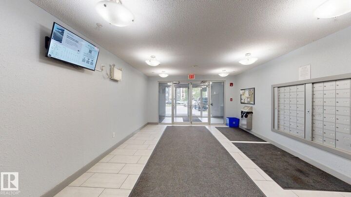 Property Photo: 11816 22 Avenue SW 207 AB T6W 2A2