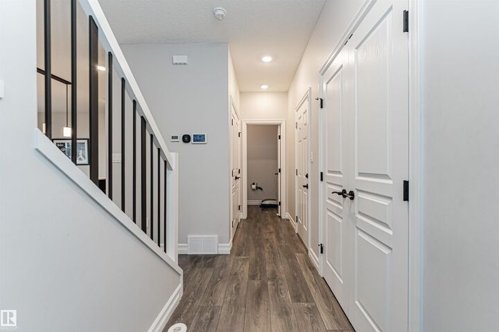 Property Photo:  8744 223 Street NW  AB T5T 7L6 