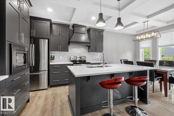 Property Photo:  148 Amberley Way  AB T8H 0X2 