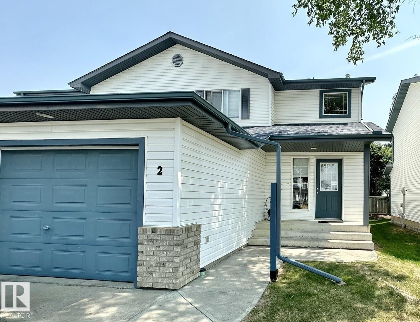 Property Photo:  #2 - 3 Grove Meadow Drive  AB T7X 4L9 